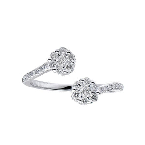 This diamond ring features pave set round brilliant cut diamonds th...