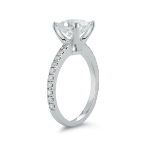 This 18k white gold diamond engagement ring setting features pave s...