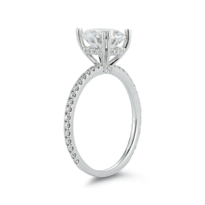 This 18k white gold diamond engagement ring setting features pave s...
