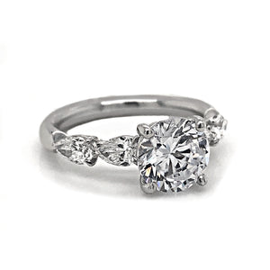Precision Set Pear Sidestone Diamond Engagement Ring