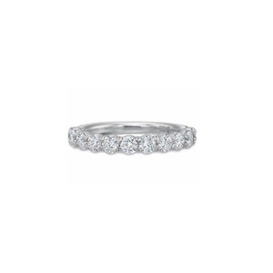 This diamond wedding band by Precision Set features round brilliant...