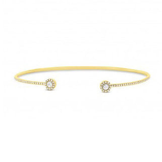 This yellow gold bracelet features rose cut diamonds that total .33...