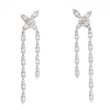 These 14k white gold earrings feature chandelier style drops with b...