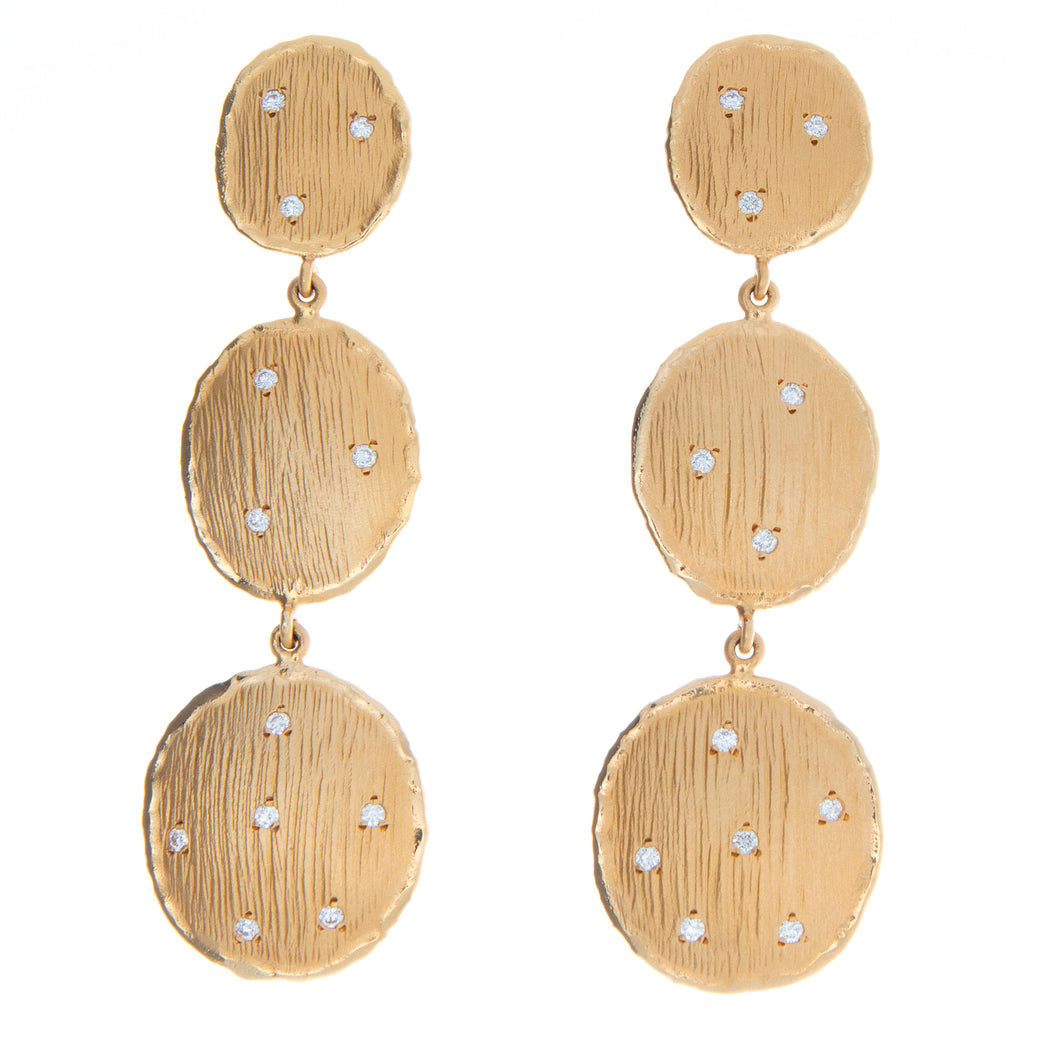 These uniquely designed, 14k yellow gold earrings feature scattered...