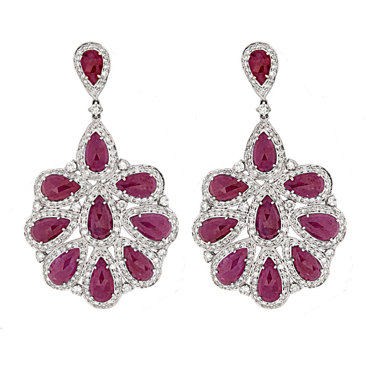 These stunning one of a kind earrings feature diamonds that total 5...