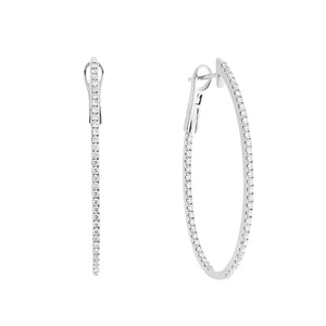 These hoop earrings feature pave set round brilliant cut diamonds t...