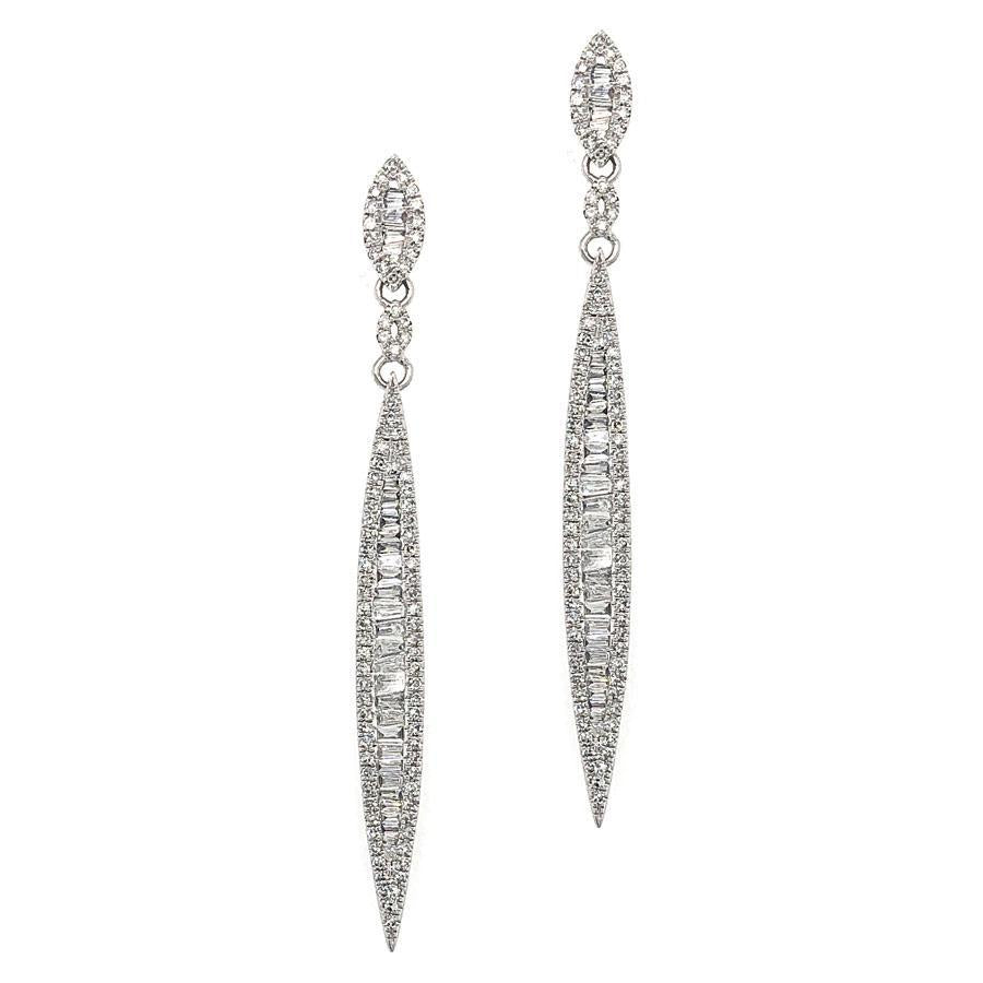 These diamond earrings feature 58 baguette and 180 round brilliant ...