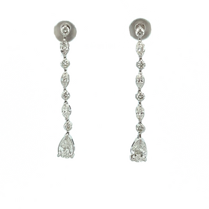 These elegant 18k white gold dangle earrings feature 6 round brilli...