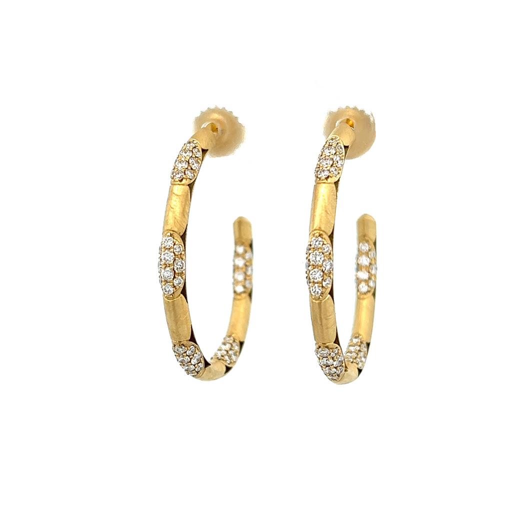 These 18KT Yellow Gold Hoops, featuring 1.23CTW round brilliant dia...