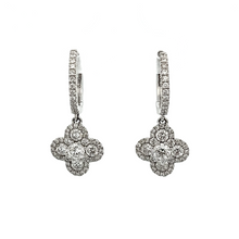 These beautiful 18k white gold earrings feature 100 diamonds on the...