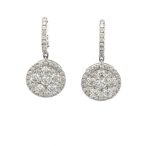 These elegant drop earrings feature round brilliant cut diamonds on...