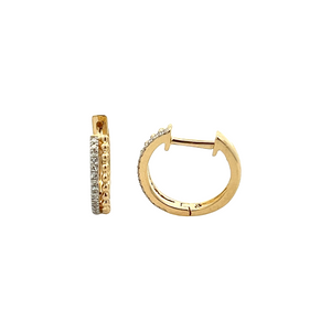 These huggy hoops feature 32 round brilliant cut diamonds totaling ...
