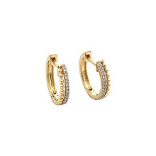 These huggy hoops feature 32 round brilliant cut diamonds totaling ...