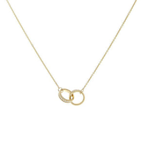 This necklace features two small diamond rings that total .45cts.