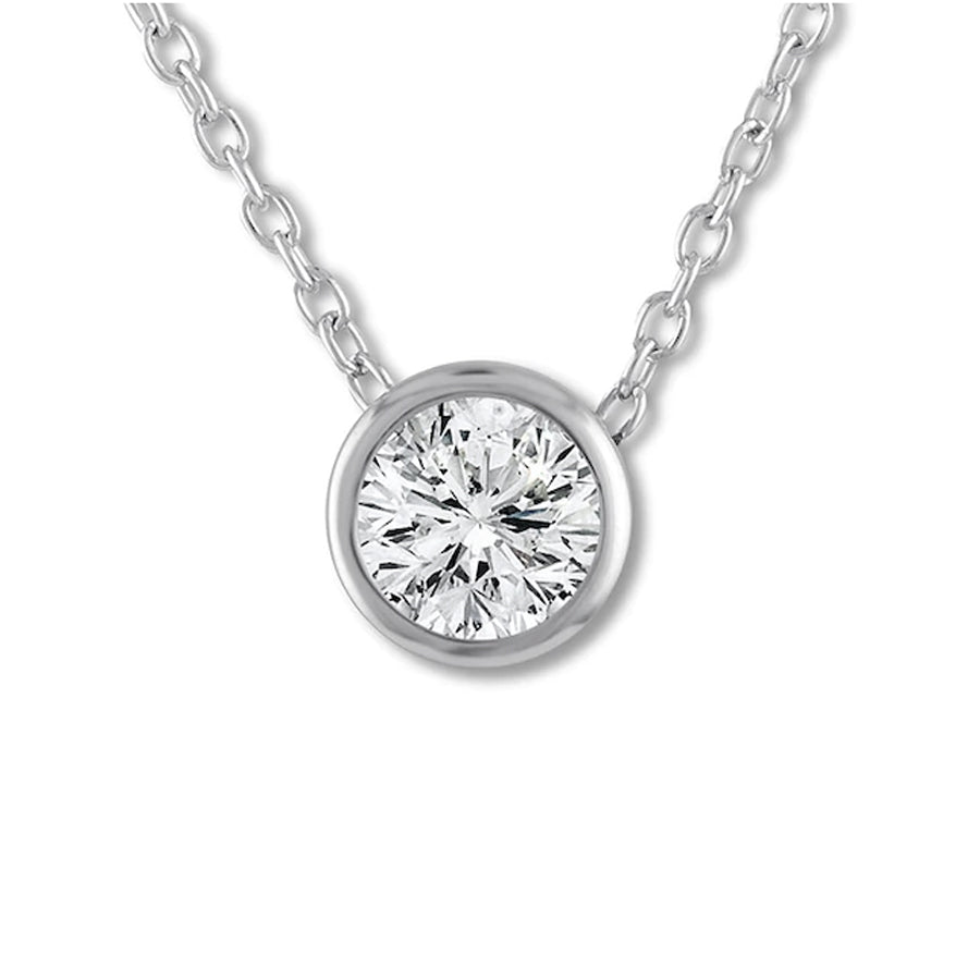 This necklace features a bezel set diamond that total totals .50cts.