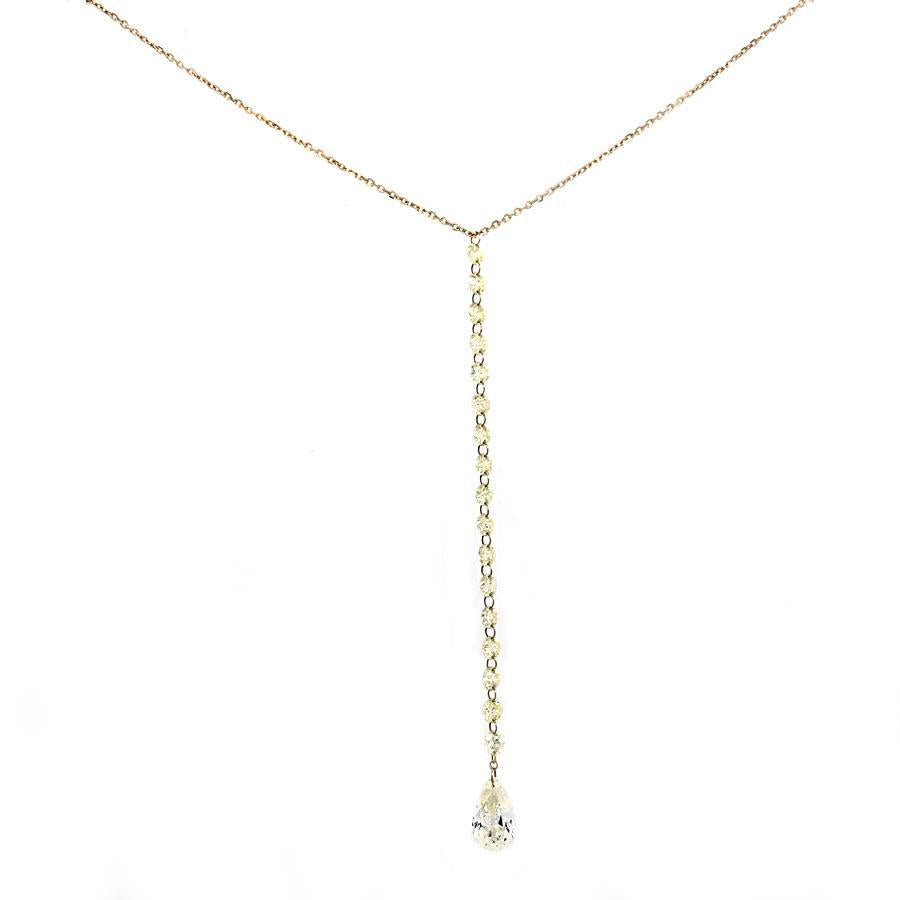 This necklace features round brilliant cut diamonds that total 1.12...