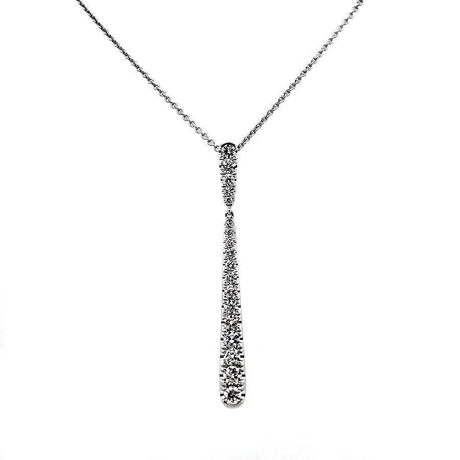 This necklace features round brilliant cut diamonds that total 1.00...