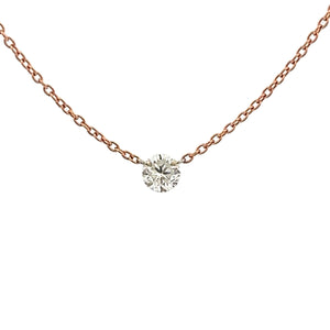 A modern and minimalist rose gold necklace with a diamond totaling ...