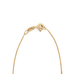 This 14k yellow gold necklace features a black enamel mushroom pend...