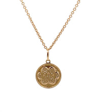 This necklace for dog lovers has a 14k yellow gold disc with a dog ...