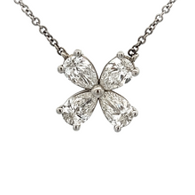 This 14k white gold necklace features 4 pear shape diamonds totalin...