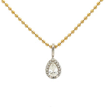 This beautiful pendant features a pear shape diamond in the center ...