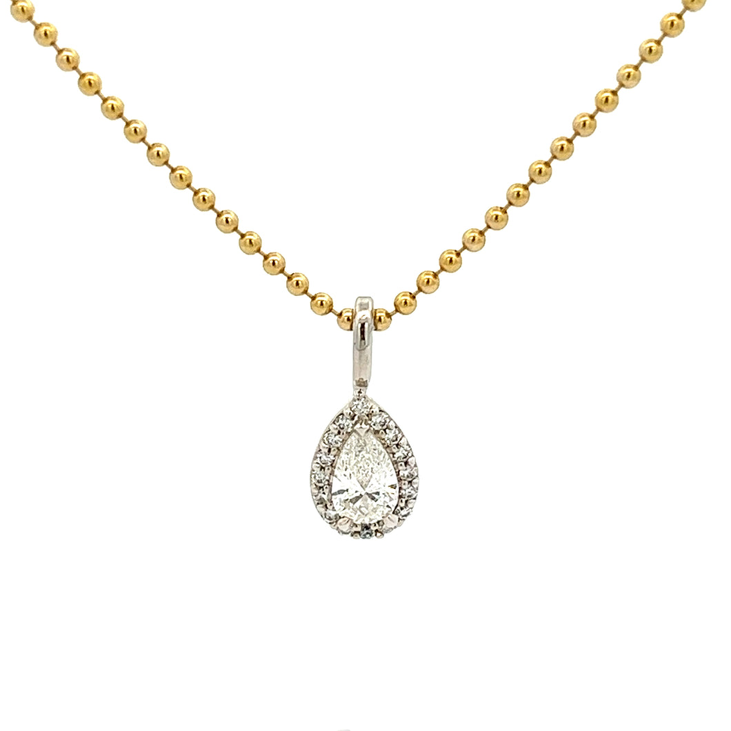 This beautiful pendant features a pear shape diamond in the center ...