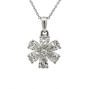 This 18k white gold necklace features 6 pear shape diamonds totalin...