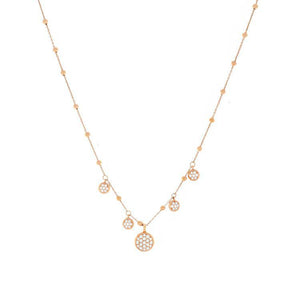 This necklace features diamond cluster drops that total .76cts.