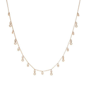 This necklace features round brilliant cut diamonds that total .83cts.
