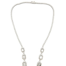 This stunning diamond necklace is made in 18 karat white gold and f...