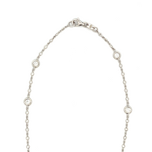 This beautiful diamonds by the yard necklace features 25 bezel-set ...