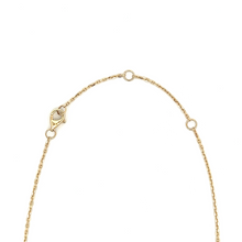This 14k yellow gold necklace features round brilliant cut and bagu...