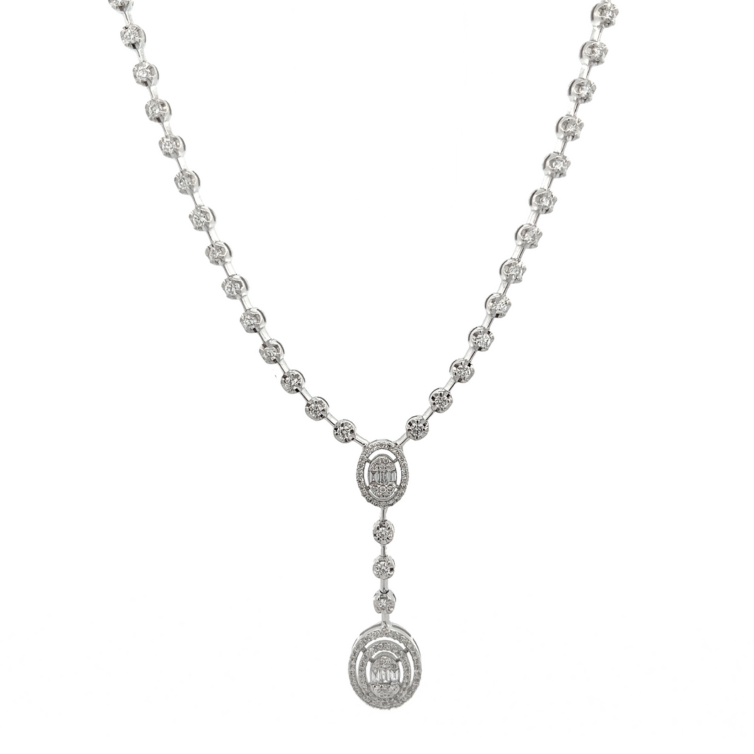 This gorgeous necklace features round brilliant cut and baguette cu...