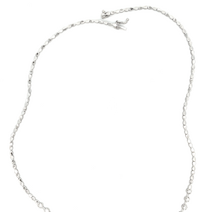 This gorgeous necklace features round brilliant cut and baguette cu...
