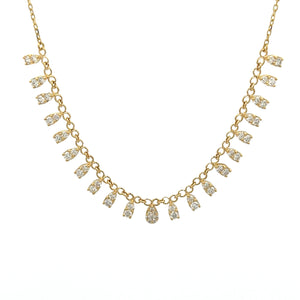 This 18k yellow gold necklace features round brilliant cut diamonds...