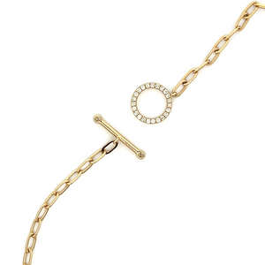This 14k yellow gold toggle link necklace features round brilliant ...