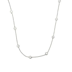 This beautiful diamonds by the yard necklace features bezel-set rou...