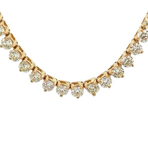 This gorgeous 14k yellow gold necklace features round brilliant cut...