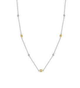 This diamond by the yard necklace features yellow and white diamond...