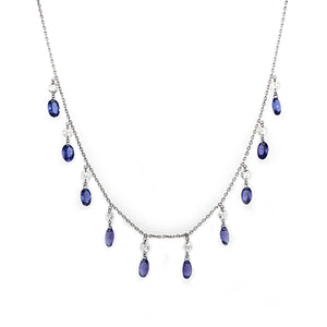 This necklace features round brilliant cut diamonds that total 1.08...