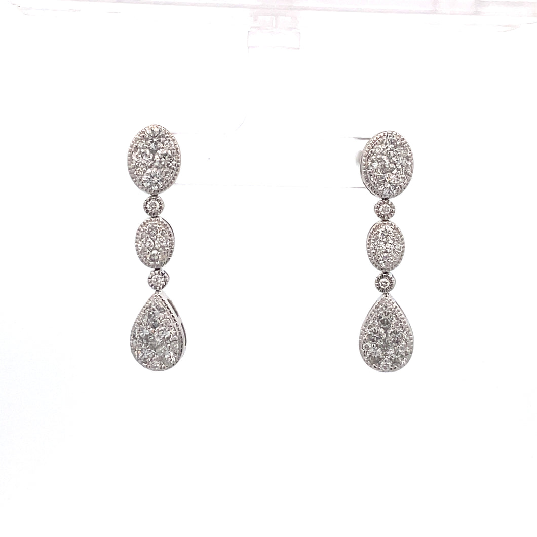 Our pear and oval shape drop earrings feature 2.75ctw round diamond...