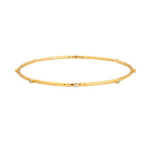 This bangle features 8 diamonds that total .14cts.