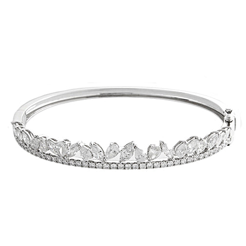 This bangle features marquise, pear and round brilliant cut diamond...