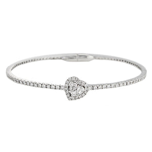 This bangle features round brilliant cut diamonds with a cluster he...