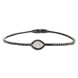 This bangle features pave set black diamonds with a cluster of whit...