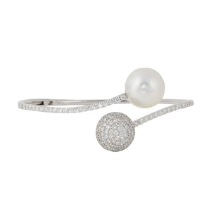 This bracelet features a South Sea pearl and round brilliant cut di...