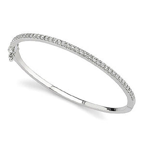This diamond bangle features pave set round brilliant cut diamonds ...
