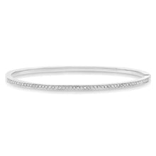 This bangle features pave set round brilliant cut diamonds that tot...