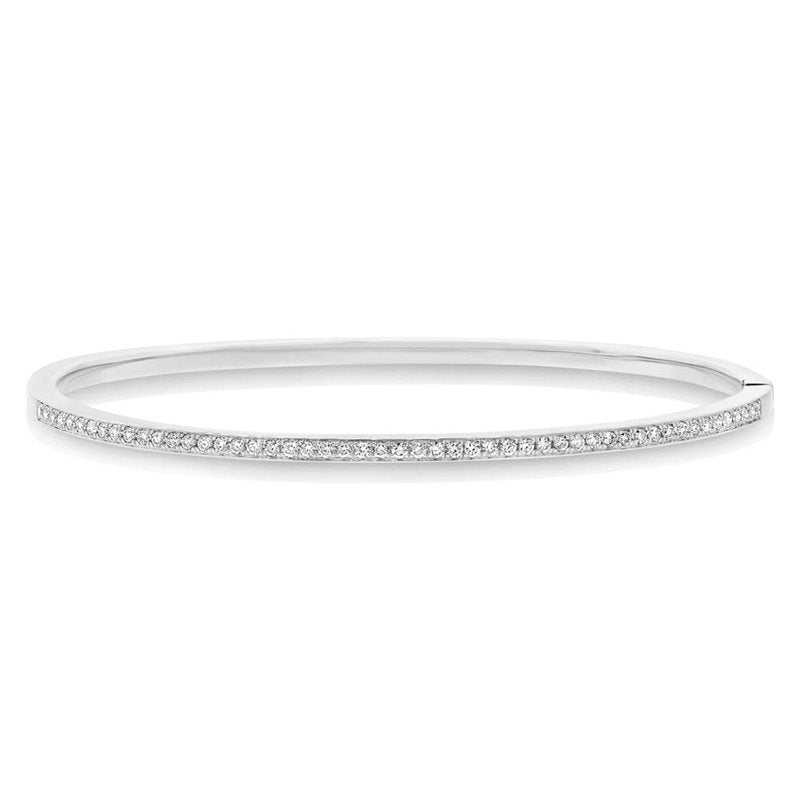 This bangle features pave set round brilliant cut diamonds that tot...